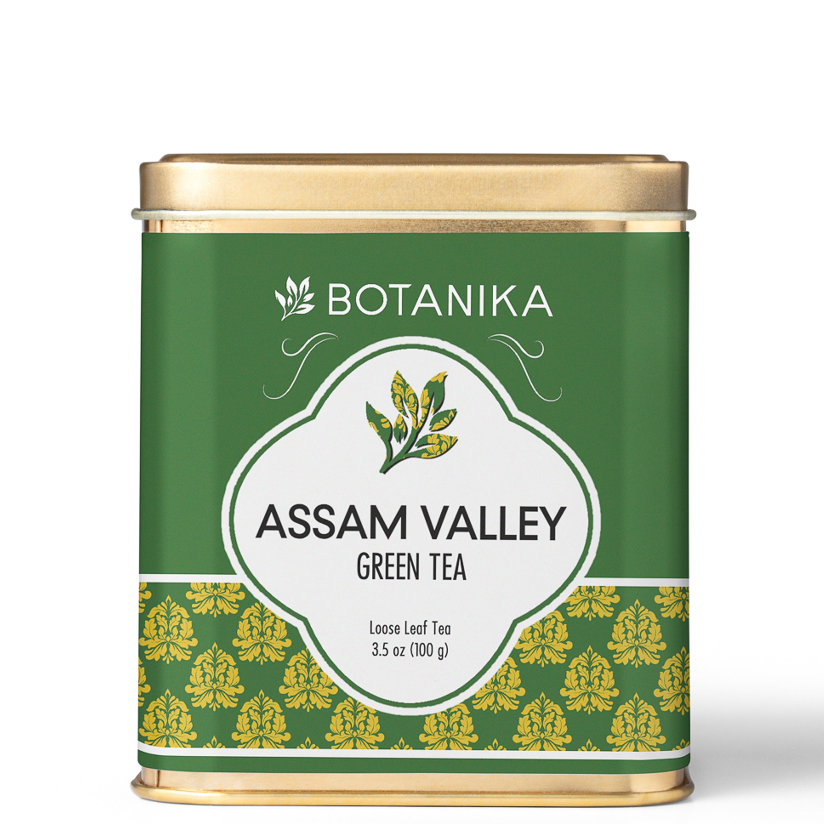 A golden tea tin for Botanika Tea's Assam Valley Green Tea.