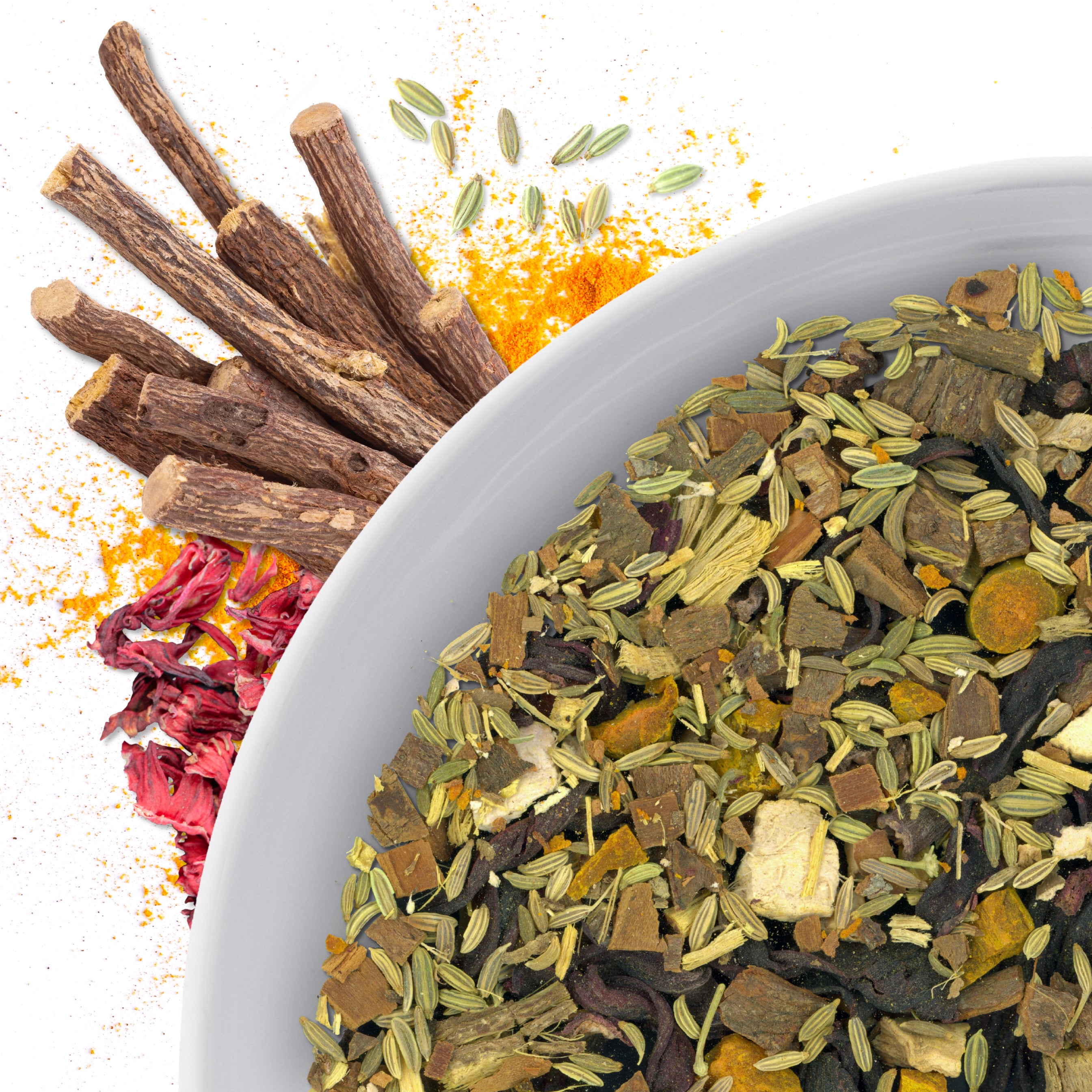 The corner of a bowl of Licorice Boost loose leaf herbal tea, with flavor notes displayed as licorice root, turmeric, fennel and hibiscus.