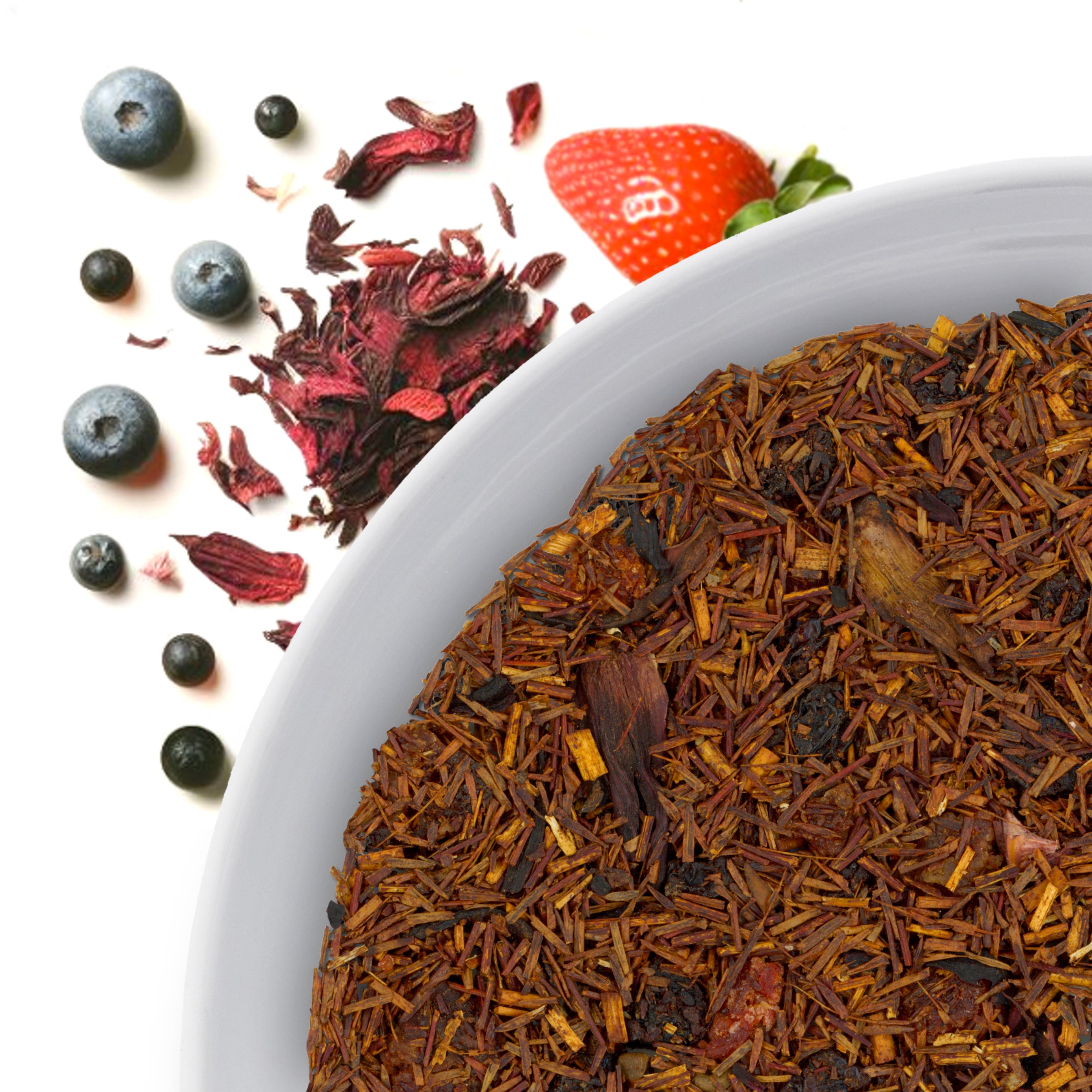 The corner of a bowl of Rooibos Berry loose leaf herbal tea, with flavor notes displayed as hibiscus, strawberry, and blueberries.