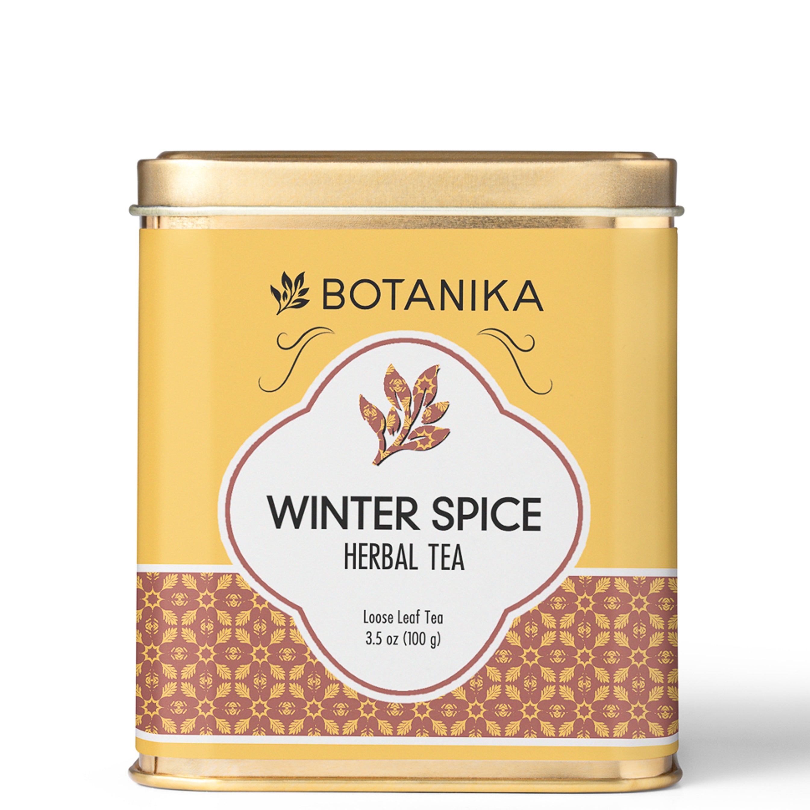 A golden tea tin for Botanika Tea's Winter Spice Herbal Tea.